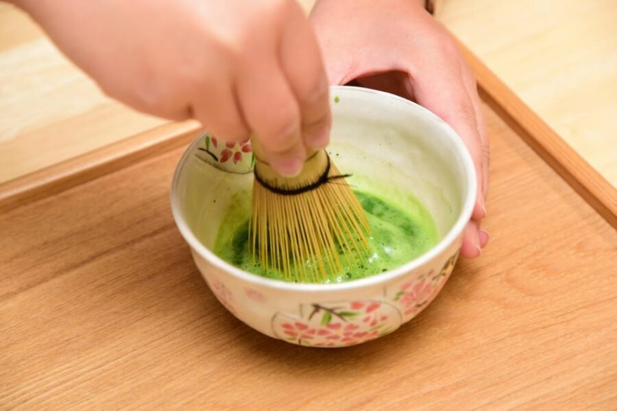 Kyoto: Tea Museum Tickets and Matcha Grinding Experience - Entering the 1F reception and the History Room with the 10-yen coin