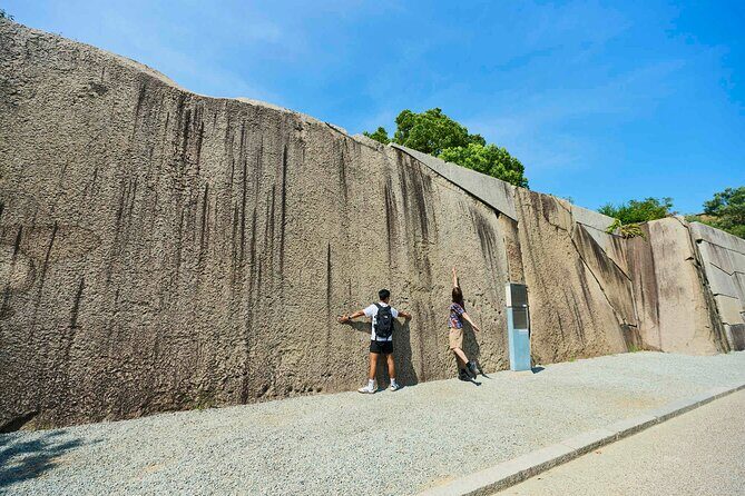 Osaka Castle Walking Tour and Castle Tower Admission - Walking the fortress: moats, gates, and a military mindset