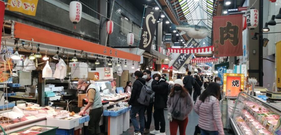 Osaka: Five Must-See Highlights Walking Tour & Ramen Lunch - Dotonbori and Ebisu Bridge: Running Man photos in Osaka’s neon heart