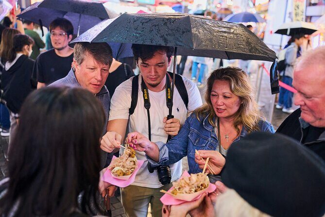 Osaka: Guided Food Tour with 12 Dishes at 4 Local Eateries - What You’ll Eat: Dumplings, Takoyaki, Skewers, and Fish